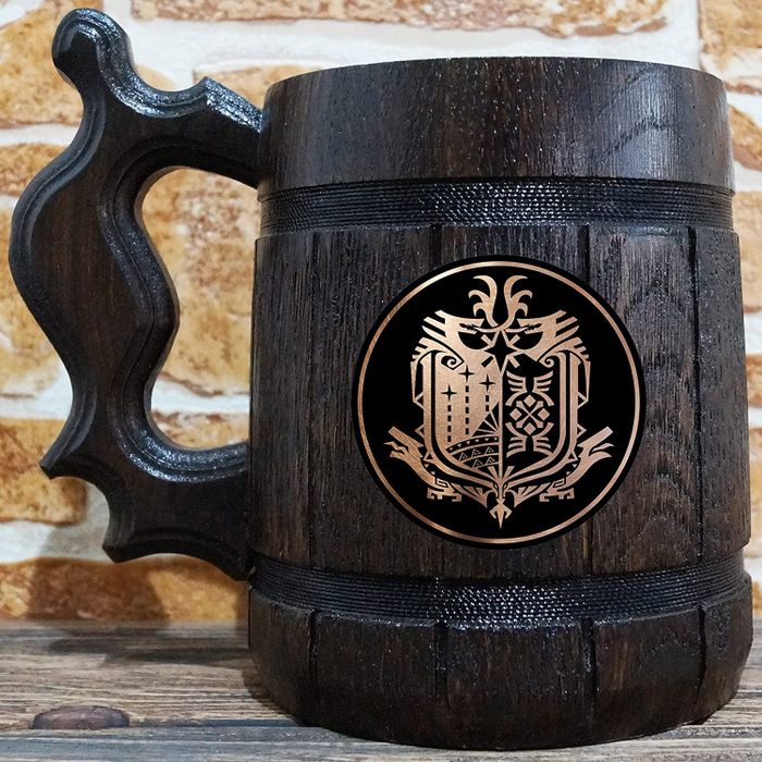 A wooden tankard with a metallic finish.