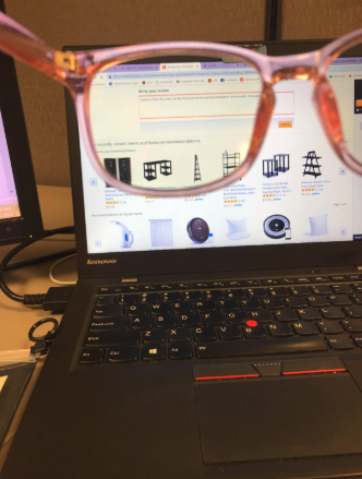 A photo of a reviewer demonstrating how the glasses help alleviate eye strain
