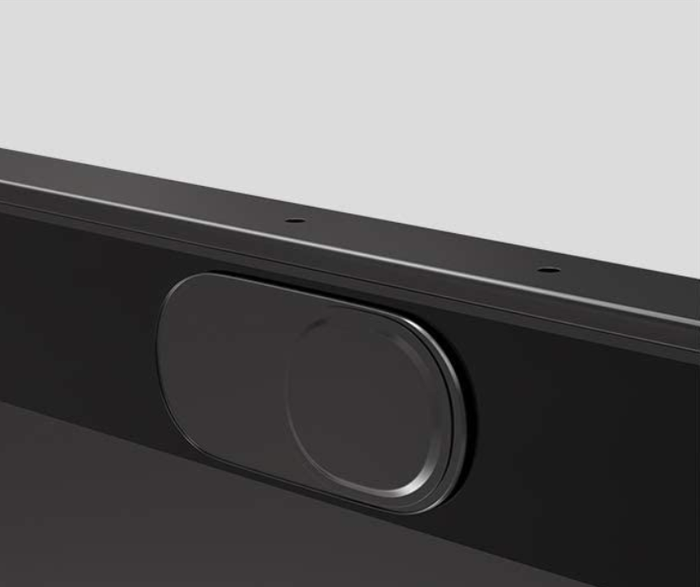 The cover is closed, effectively blocking the camera.