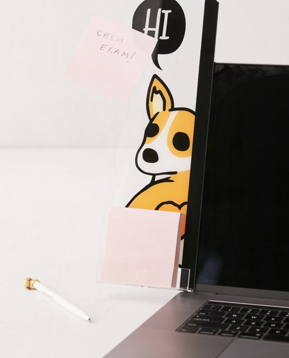 A bookmark-sized memo holder attached to the side of a laptop, perfect for keeping small post-it notes.