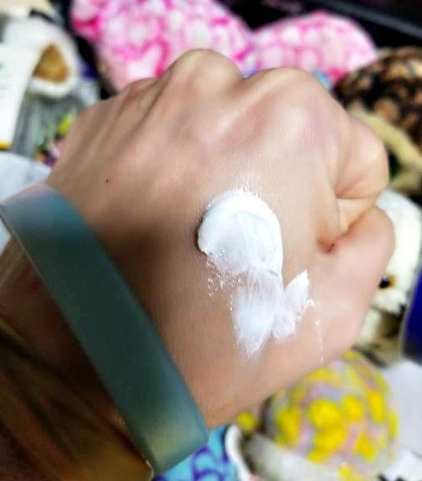 Nivea Creme on the reviewer's hand.
