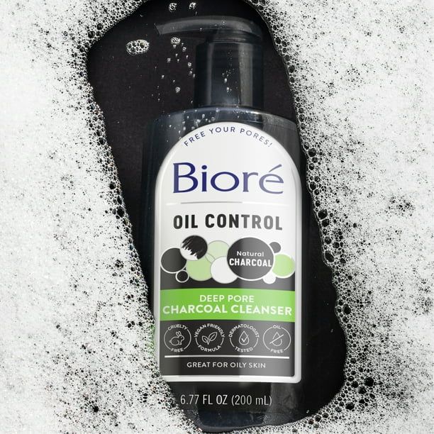 The bottle is displayed surrounded by bubbles.