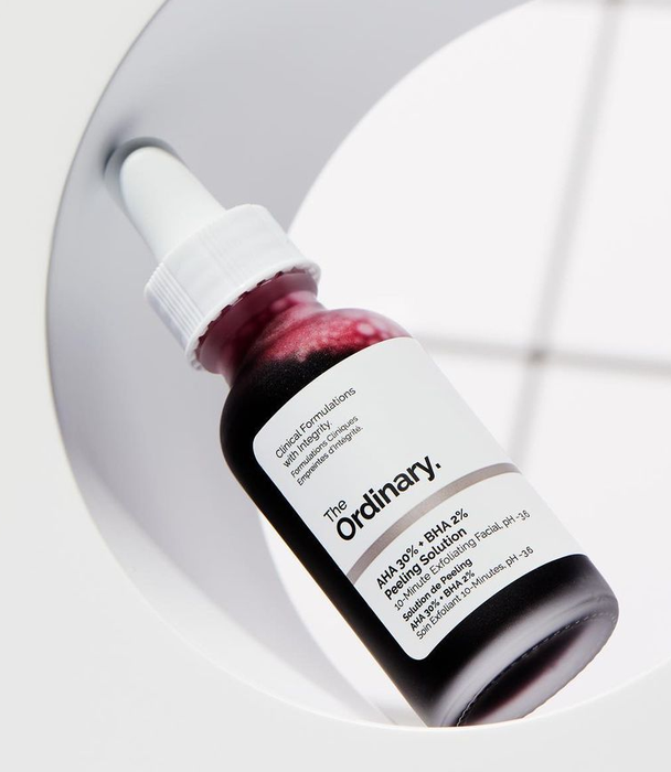 a bottle of AHA peeling solution