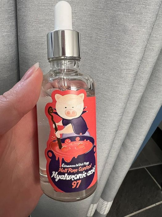 photo of reviewer holding the serum