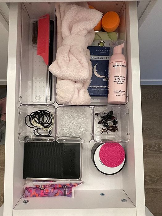 Another reviewer image displaying the organizers in a drawer, showcasing their practicality.