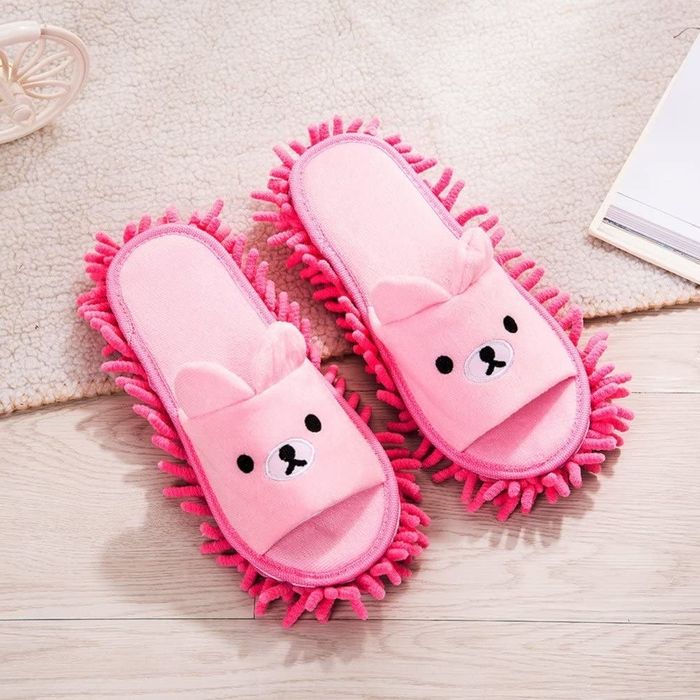Pair of pink bear-shaped cleaning slippers