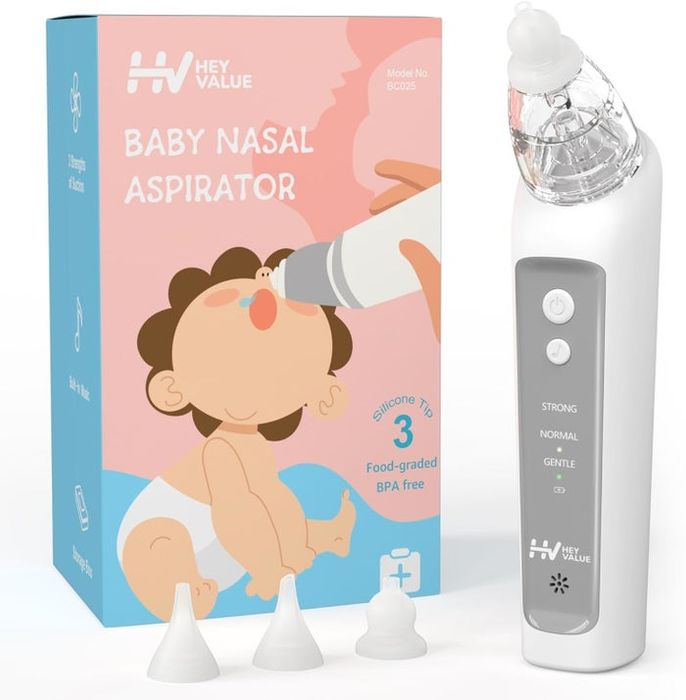 A baby nasal aspirator with three silicone tips displayed alongside its packaging, showing a baby using the product