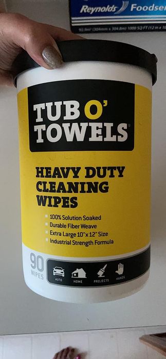towels stored in a tube-shaped container