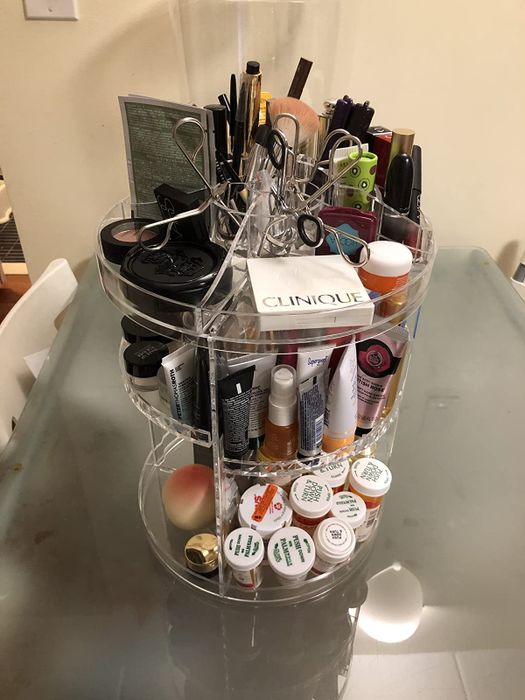The same makeup items now organized within the rotating makeup organizer.