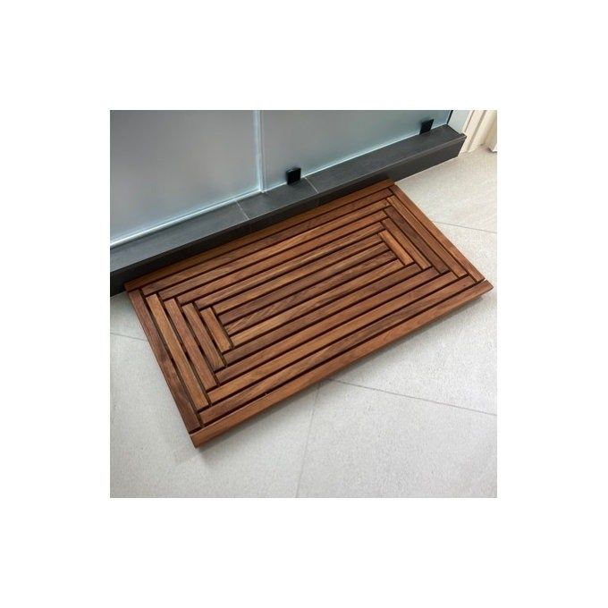 A wooden slatted bath mat, perfect for adding a touch of natural elegance to your bathroom.