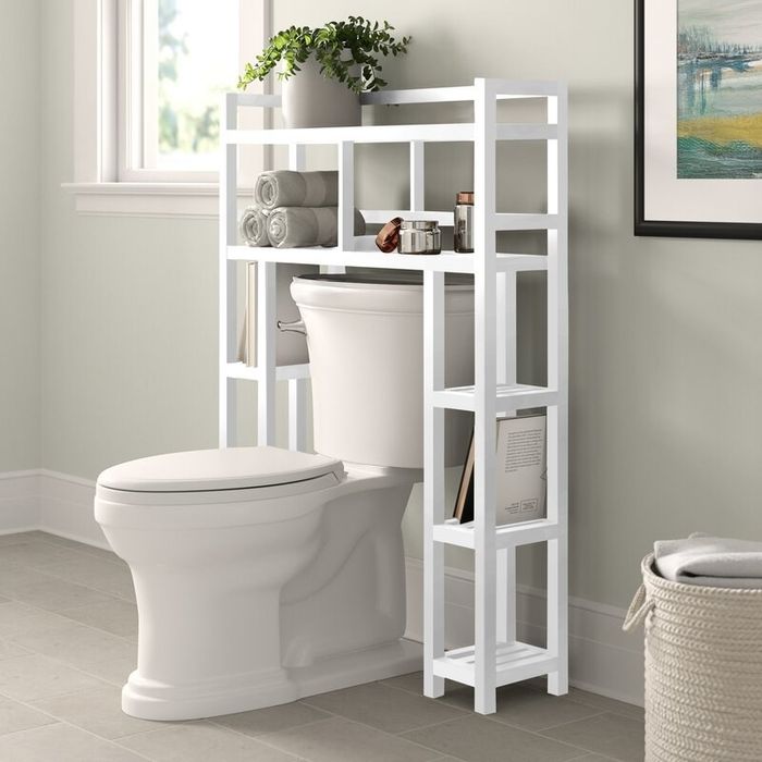 A stylish over-the-toilet storage shelf set up in a bathroom, providing functional organization.
