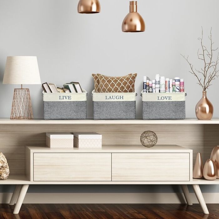 The twill baskets containing a variety of items inside.