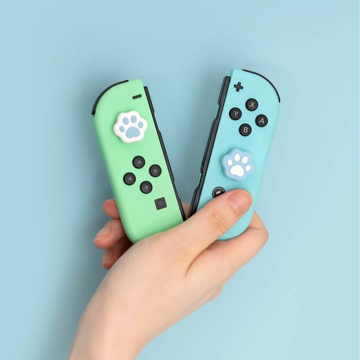 gaming controllers featuring paw print-shaped silicone caps