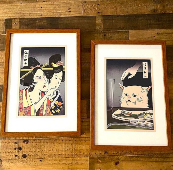Framed posters of the famous Woman Yelling at Cat meme.