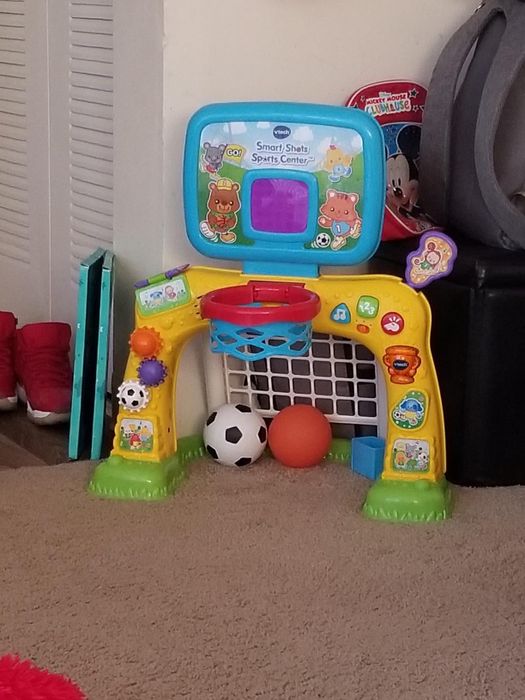 A close-up of a reviewer's toy sports center, showcasing its colorful and engaging design.