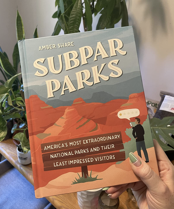 A customer review photo of them holding the book.