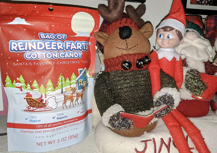 A customer's photo of the bag of cotton candy placed beside their Elf On The Shelf