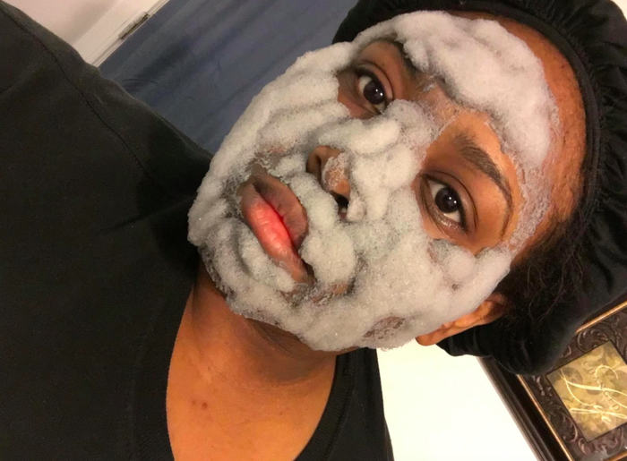 A customer review photo of them using the bubble clay mask.