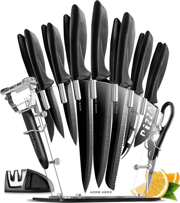 The set of knives and accessories neatly arranged in a clear block