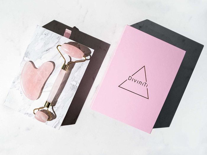 The rose quartz roller and scraper.