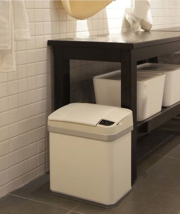 The sleek white trash can