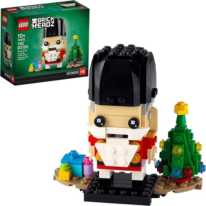 The Lego Nutcracker figure displayed next to a Christmas tree.