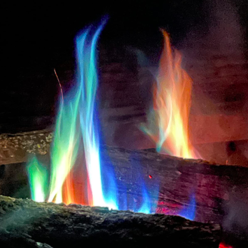 A photo of a colorful campfire from a reviewer