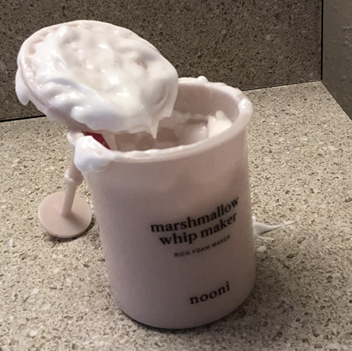 A customer review showing the Nooni Marshmallow Whip Maker with the lid opened, displaying the foam inside.