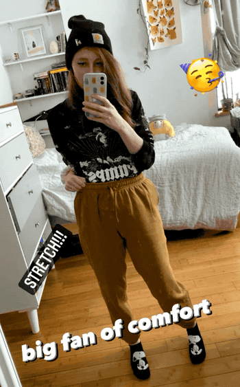 Mytour writer's Instagram story GIF showing me stretching out the waistband with the caption 'Big fan of comfort'