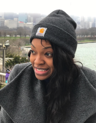 A reviewer sporting the black beanie.