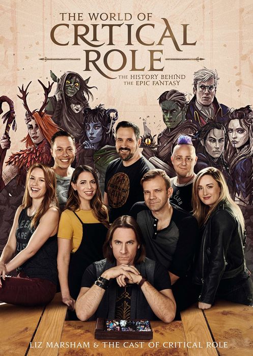 The cast featured on the cover of the book, posed alongside their illustrated counterparts.