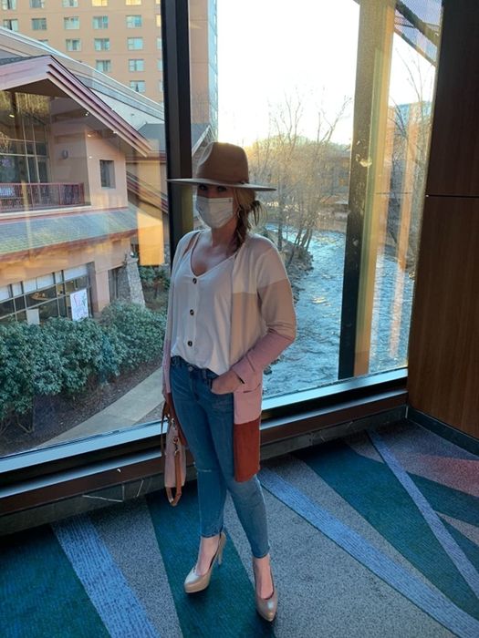 Another reviewer styled in the tank under a cardigan