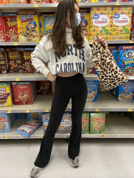 A reviewer rocking a pair of sleek black pants.