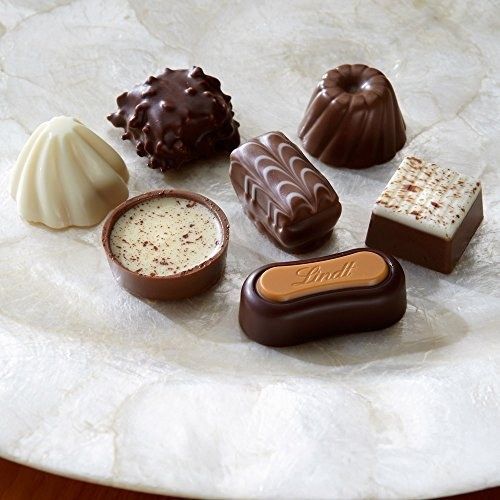 A plate featuring a selection of delicious chocolate truffles.