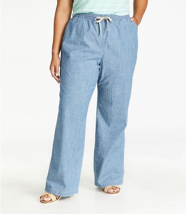 A front view of the model rocking the chambray pants.
