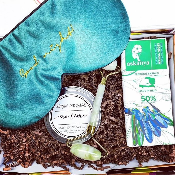 a gift box filled with spa treats and chocolates