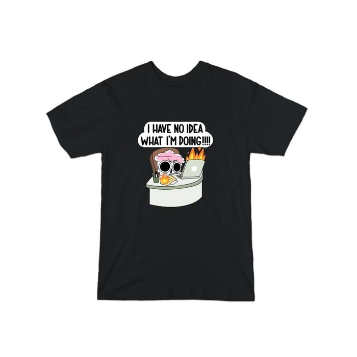 The black shirt with The Good Advice Cupcake graphic, featuring work supplies in flames and a speech bubble that says, 