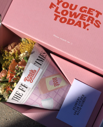 A box filled with a stunning flower bouquet