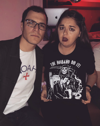 A Mytour editor in a black tee that reads