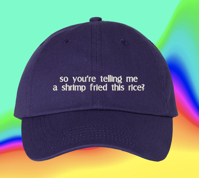 A black hat with white text that reads,
