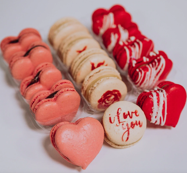 collection of heart-shaped and printed macarons