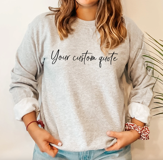 A model showcasing a gray sweatshirt, customizable with personalized text