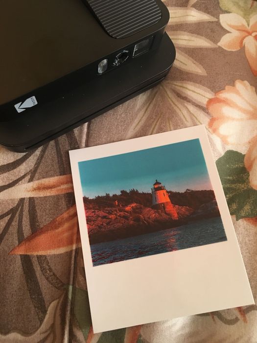 A printed photo of a lighthouse.