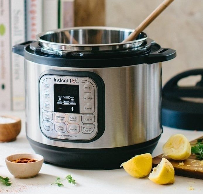 The sleek silver and black Instant Pot, a kitchen gadget that brings convenience and efficiency to your cooking.