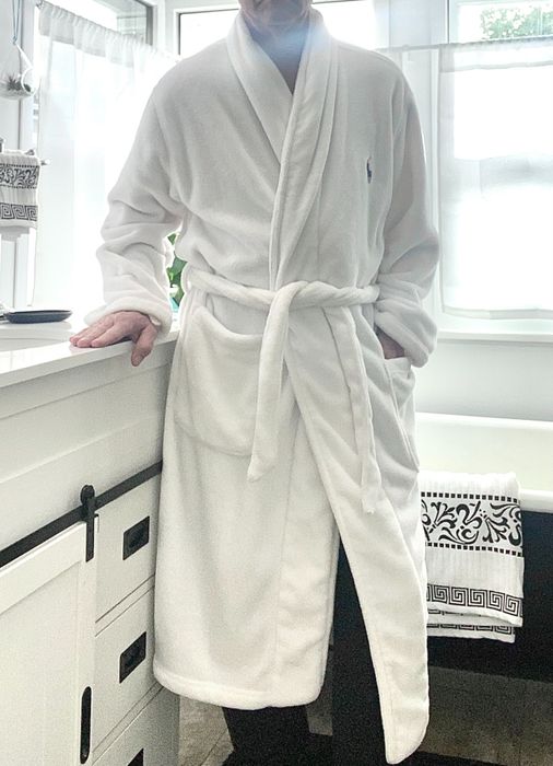 A reviewer modeling the white Ralph Lauren robe