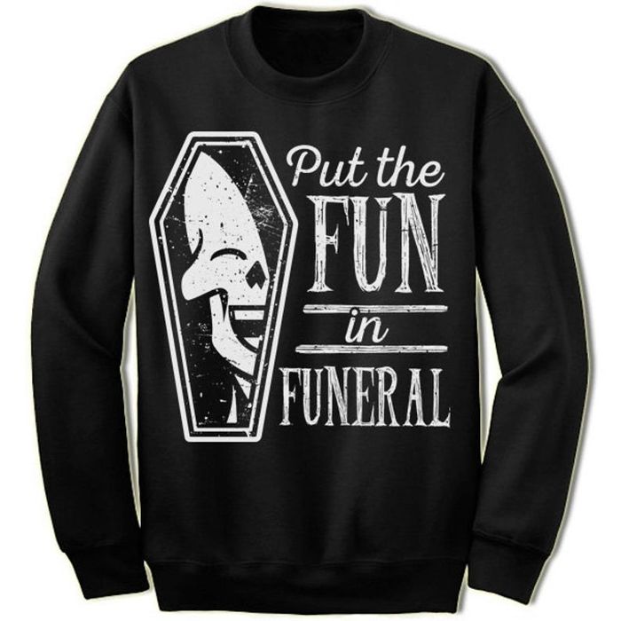 Sweatshirt with a skeleton and coffin design, reading "I put the Fun in funeral"