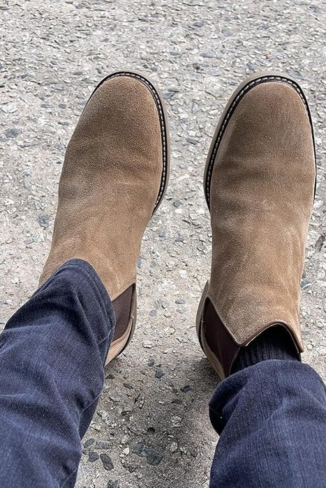 The same reviewer displaying the boots from another perspective