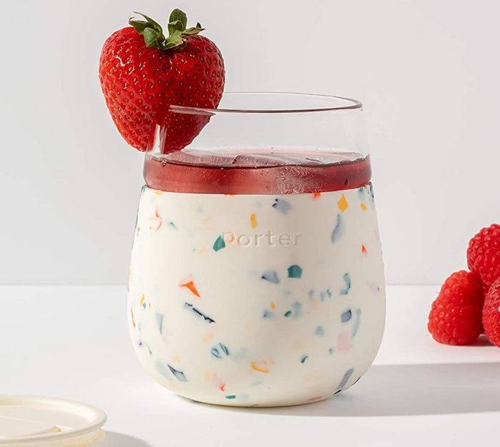 The white wine glass adorned with playful confetti patterns.