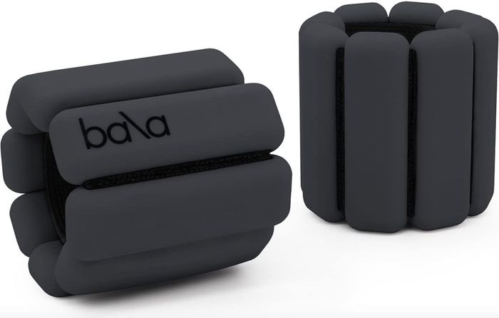 The pair of Bala Bangles in a sleek charcoal finish