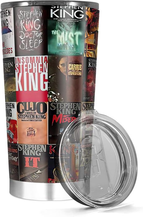 A tumbler featuring a collage of Stephen King book covers, including